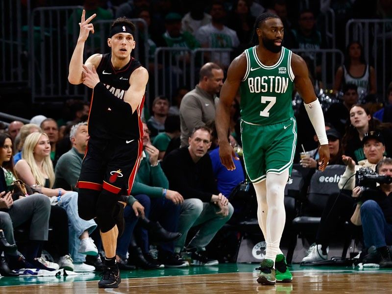 Heat rain triples to stun Celtics in series-tying win