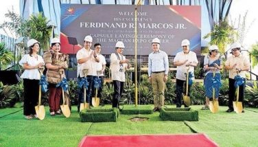 President Marcos and Alliance Global Group Inc. chief executive officer Kevin Tan lead the capsule-laying ceremony for Megaworld&acirc;��s grand township Mactan Expo Center at Mactan Newtown in Lapu-Lapu City, Cebu yesterday. Also in photo are Speaker Martin Romualdez and Special Assistant to the President Anton Lagdameo.