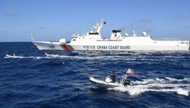 This photo taken on Feb. 16, 2024 shows Filipino fishermen aboard their wooden boats (middle L and 2nd L) and Philippine Fisheries and Aquatic Resources personnel aboard their rigid hull inflatable boat (foreground C) sailing past a Chinese coast guard ship (top) near the China-controlled Scarborough Shoal, in disputed waters of the South China Sea. 