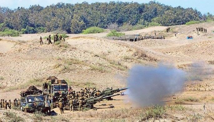US Army soldiers fire 155mm and 105mm Howitzers at floating targets during a live-fire exercise as part of Balikatan 2024 at the La Paz Sand Dunes in Laoag City, Ilocos Norte yesterday.