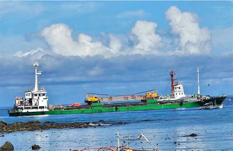 Beached cargo vessel removed from position