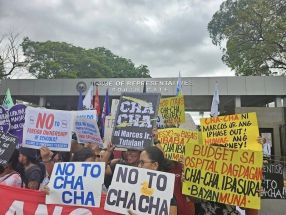 Groups hold a protest against charter change in front of the House of Representatives in March 2024.