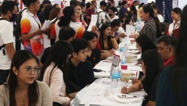 Jobseekers queue for an interview at the job fair organized by the local government inside a mall in Marikina City as part of their observance of Labor Day on May 1, 2024.