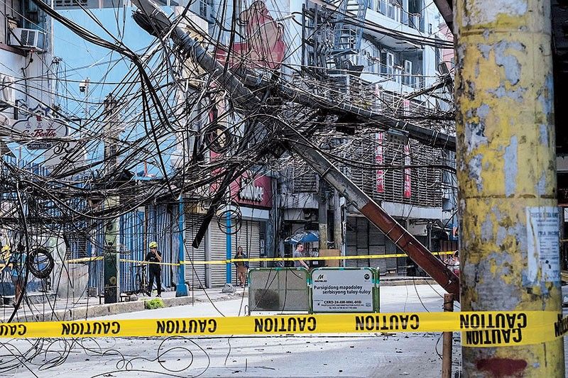 Dump truck pulls cables, knocks down posts