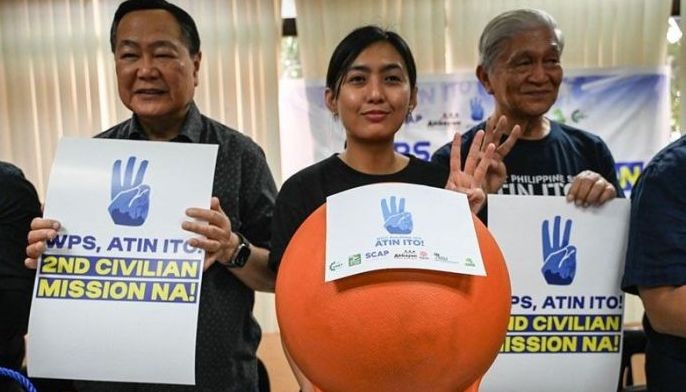 Members of the Atin Ito (It&acirc;��s Ours) Coalition, a civilian-led mission to the South China Sea, show the buoys that will be used in Scarborough Shoal, during a press conference in Quezon City, Metro Manila on May 8, 2024.