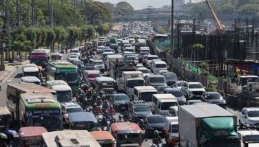 Motorists and commuters experience heavy traffic along the southbound lane of Kamuning and the westbound lane of Philcoa in EDSA, Quezon City as work resumes on April 1, 2024. 