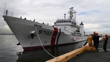 In this file photo taken on June 1, 2022 Philippine coast guard personnel handle dock line as the second newly-acquired 97-meter Multi-role Response Vessel (MRRV) by the coast guard, the BRP Melchora Aquino (MRRV-9702) arrives from Japan at the international port in Manila. The Philippines has agreed to buy five coast guard patrol ships from Japan in a deal worth more than 400 million USD, Manila said on May 17, 2024, as the Southeast Asian country faces growing Chinese pressure in the South China Sea. 