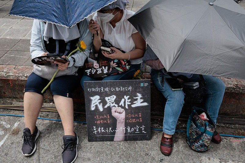 Hundreds protest Taiwan's ruling party on eve of inauguration