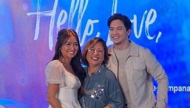 'Hello, Love, Goodbye' director Cathy Garcia-Sampana is flanked by her actors Kathryn Bernardo and Alden Richards at the special announcement of their movie's sequel titled 'Hello, Love, Again' held on May 19, 2024 in ABS-CBN. 