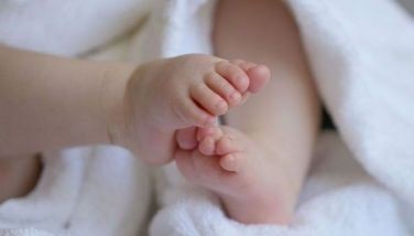 Feet of an infant.