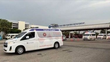This frame grab from a video by Phongsak Suksi taken and released on May 21, 2024 and made available via AFPTV shows ambulances leaving the fire station at Suvarnabhumi Airport in Bangkok, after a Singapore Airlines London-Singapore flight hit severe turbulence and was forced to make an emergency landing. 