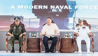 Defense Secretary Gilbert Teodoro (center), Armed Forces chief Gen. Romeo Brawner Jr. (left) and Navy chief Vice Adm. Toribio Adaci Jr. lead the celebration of the Philippine Navy&acirc;��s 126th anniversary at the Navy headquarters in Manila yesterday.