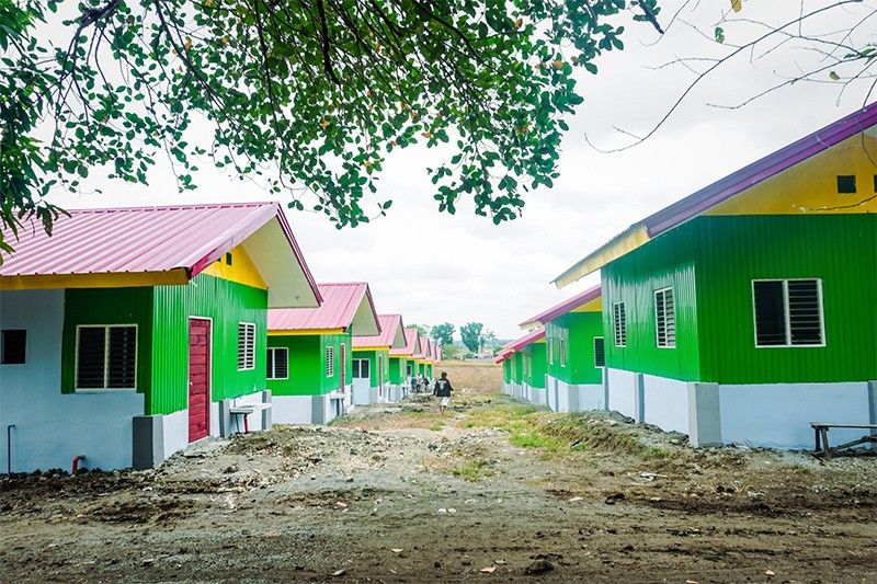 74 internally displaced Moro families receive colorful houses in Maguindanao del Sur