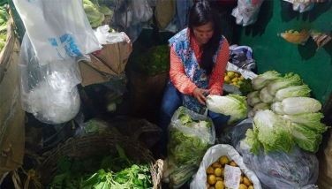 Vendors are seen selling various fresh produce at the Baguio City Market on April 25, 2024.