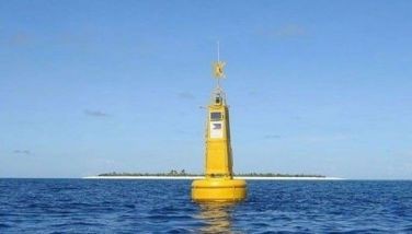 Photo shows a 30-foot navigational buoy bearing the Philippine flag and deployed by the Philippine Coast Guard at the West Philippine Sea.