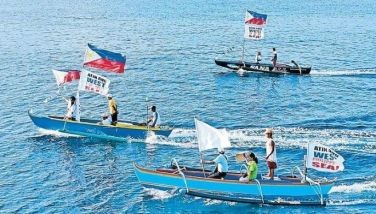 Fisherfolk join a fluvial parade in Candelaria, Zambales on May 11 to oppose the continued harassment by the China Coast Guard of Filipino fishermen in the West Philippine Sea.