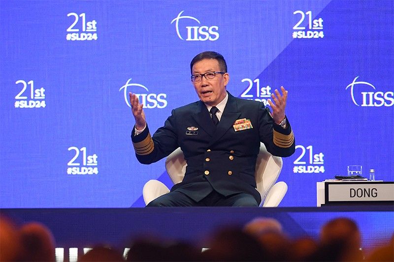 China defense minister warns of 'limits' to Beijing's restraint on South China Sea