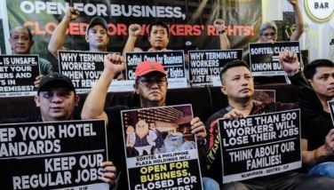 Officials from the National Union of Workers in Hotel, Restaurant, and Allied Industries (NUWHRAIN), representing employees of the Sofitel Philippine Plaza, hold a press conference on Monday at a restaurant in Manila to challenge the termination of the workers as they believe the hotel&acirc;��s closure is only temporary.