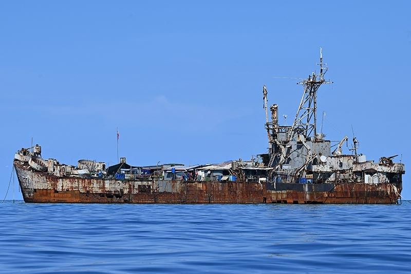 Philippines denies troops pointed guns at China Coast Guard