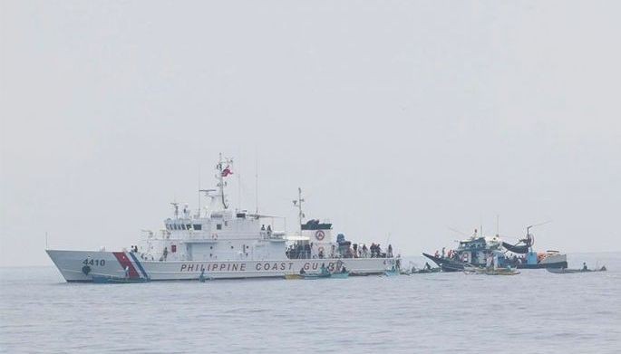 A Philippine Coast Guard vessel is seen amid the ongoing Atin Ito regatta to assert our sovereignty during the second civilian resupply mission in the West Philippine Sea  on May 15, 2024.