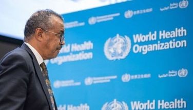 WHO Director-General Tedros Adhanom Ghebreyesus leaves a press conference at the World Health Organization's headquarters in Geneva, on December 14, 2022.