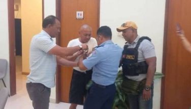 This photo shows the &quot;re-arrest&quot; of expelled lawmaker Arnolfo Teves Jr. in Timor-Leste. 