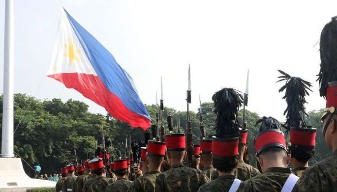 Members of the Philippine Army conduct a flag-raising rehearsal at the Rizal Park in Manila on June 11, 2024, in preparation for the celebration of the 126th anniversary of Independence Day.