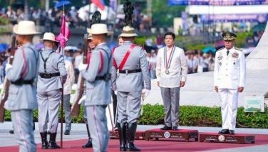 President Ferdinand Marcos Jr. leads the flag-raising ceremony at Rizal Park in Manila on June 12, 2024 as part of the country's celebration of the 126th Philippine Independence Day, along with other government officials and guests.