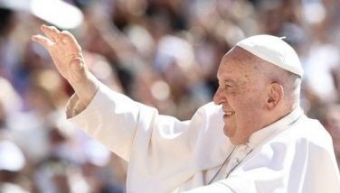 Pope Francis waves to the crowd during the weekly general audience on June 12, 2024 at St Peter's square in The Vatican.