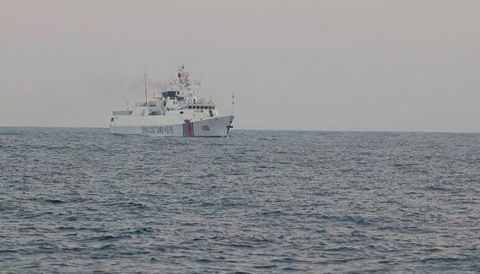 A Chinese Coast Guard ship sails beside the boat number 2 of the Atin Ito civilian resupply mission in the vicinity of the Bajo de Masinloc at the West Philippine Sea on May 15, 2024.
