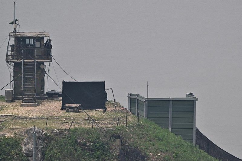 North Korea building roads, walls inside Demilitarized Zone â�� Yonhap