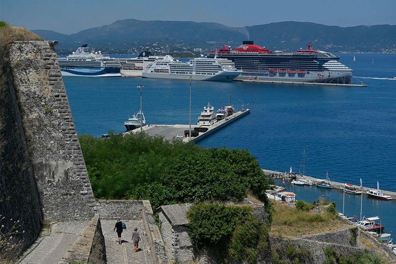 Tourist found dead off Greek island, three more missing