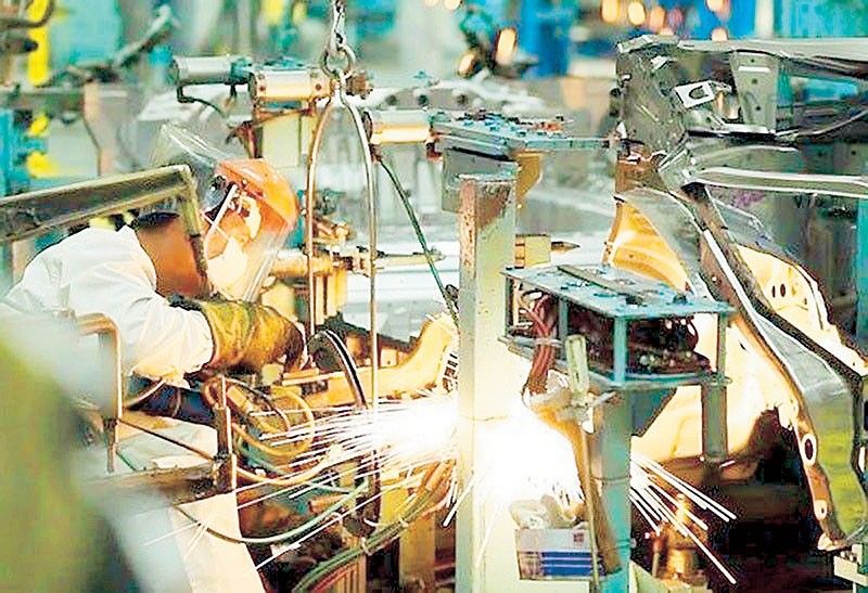 Factory output growth slows in May