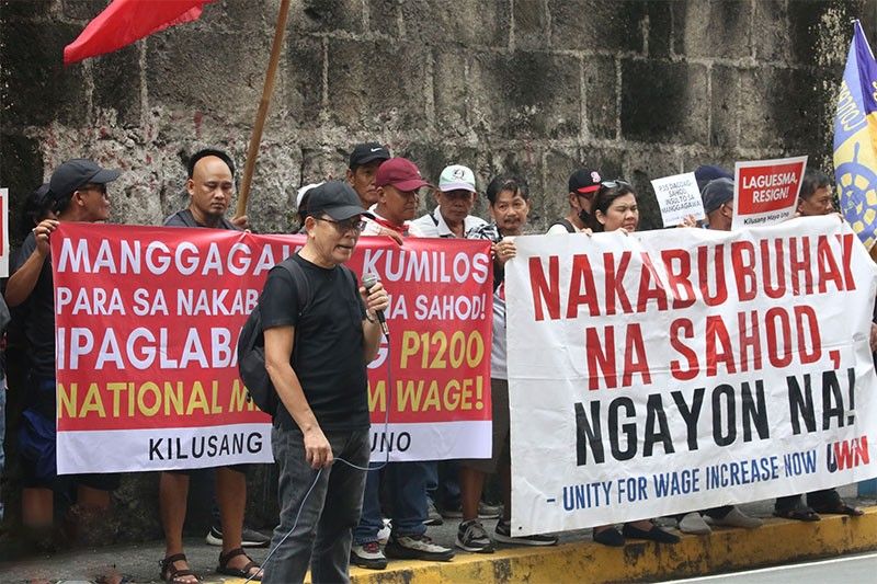 Labor groups seek to reverse P35 wage hike