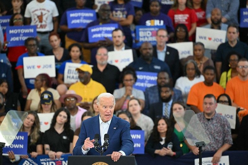 Biden defiant on campaign trail but pressure mounts