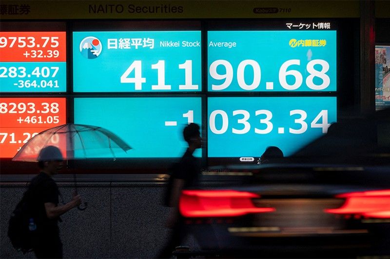 Asian markets mixed as traders digest China rate cut