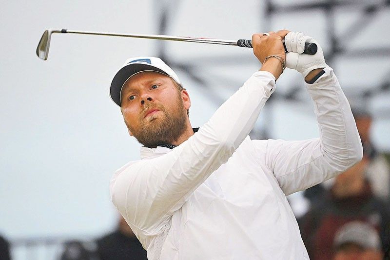 Brown takes shock British Open lead as stars struggle