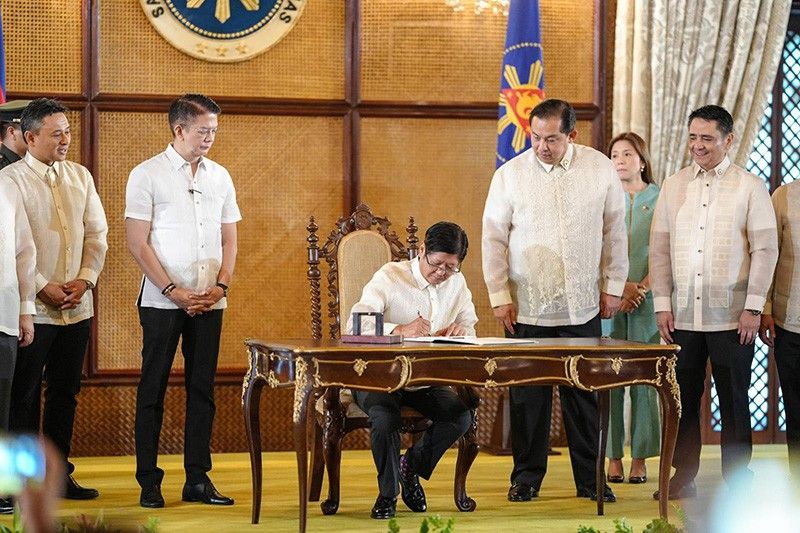 Marcos OKs new laws to enhance procurement, fight online scams