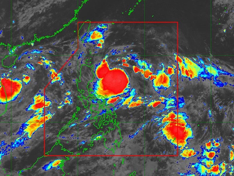 Tropical Storm Carina slightly intensifies over Philippine Sea