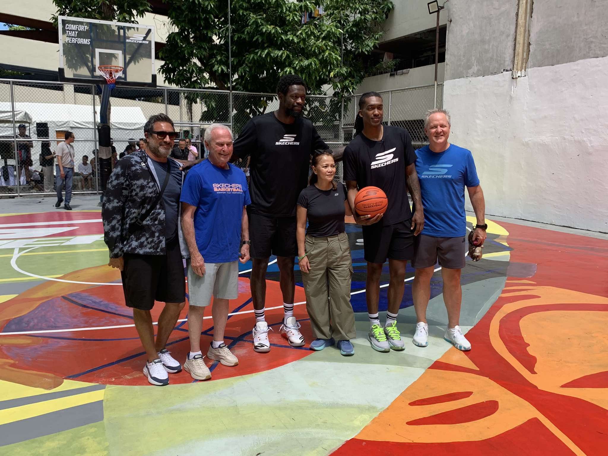 NBA stars Randle, Mann grace unveiling of new mural at famed Tenement Court