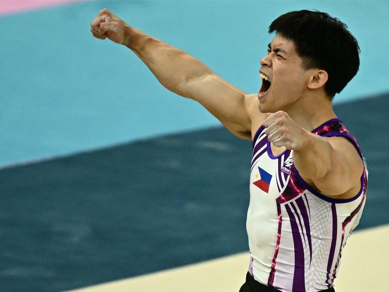 King Carlos ascends to gymnastics throne in Paris