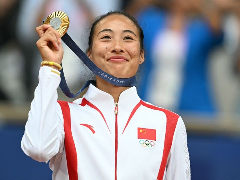 Zheng Qinwen makes history with Olympic singles gold