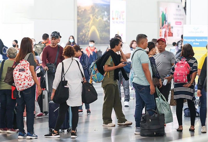 30 distressed OFWs back from Kuwait