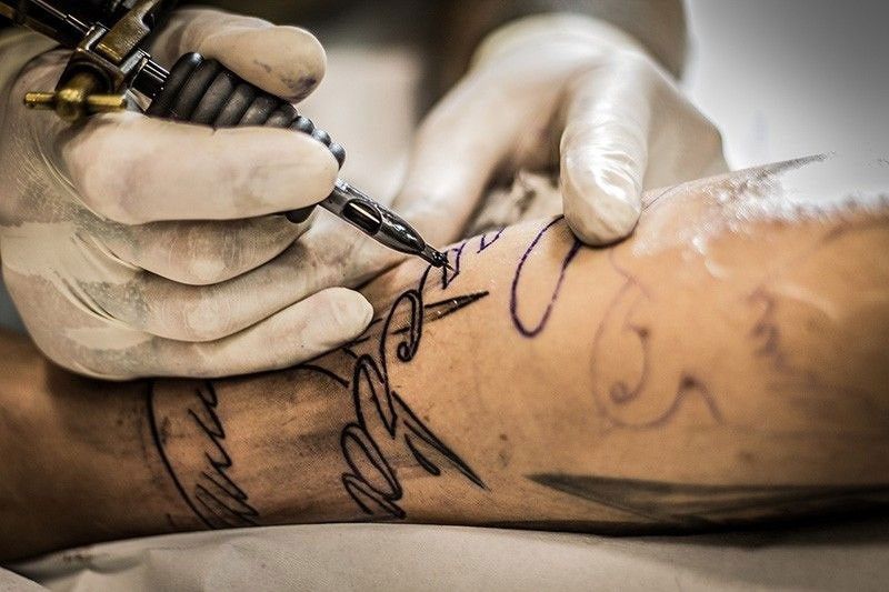 Visible tattoos now banned for PNP officers, recruits