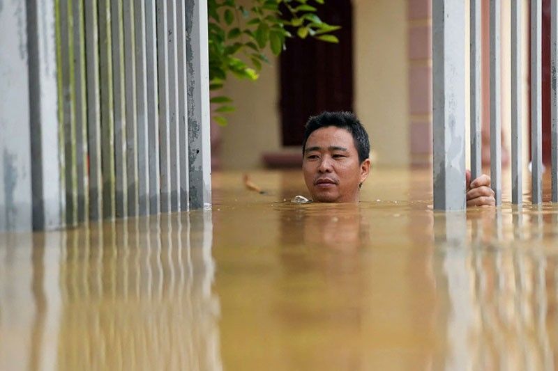 Vietnam evacuates 59,000 as typhoon floods toll climbs to 127