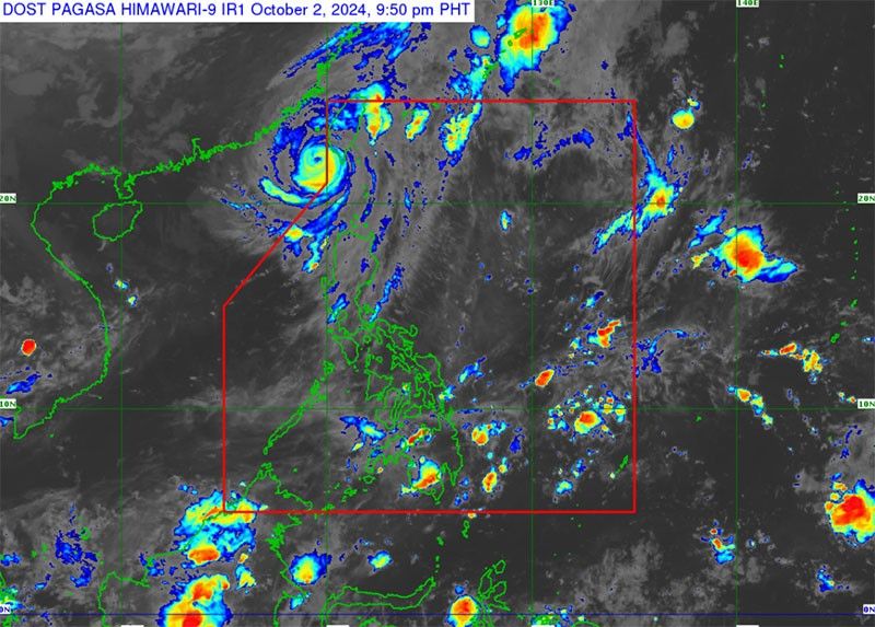 â��Typhoon Julian weakensâ��