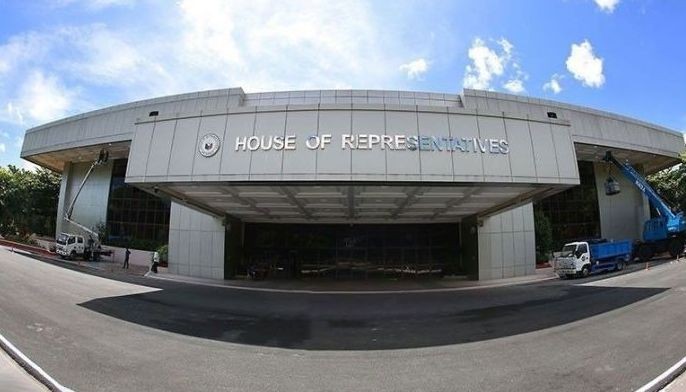 Workers do renovation works around the House of Representatives within the Batasang Pambansa Complex in Quezon City on July 3, 2024. 