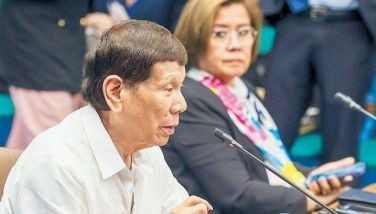 Former president Rodrigo Duterte answers questions from senators as former senator Leila de Lima looks on during the first hearing of the Senate Blue Ribbon subcommittee on his administration&acirc;s war on drugs on October 28, 2024.