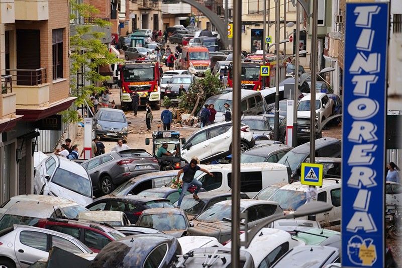 Spain flood death toll soars to 158, 'dozens' missing