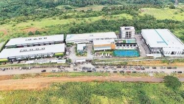 Drone shot shows buildings of a suspected illegal Philippine offshore gaming operator within the freeport zone in Bagac, Bataan yesterday. 